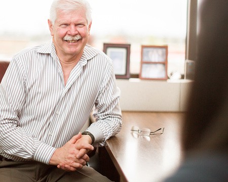 Caption of photo goes here for all menu pages and staff members in candid photos engaging with clients.